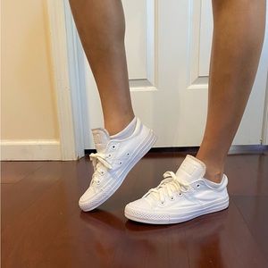 All star white low top converse.